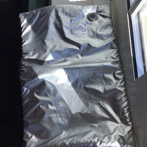 Electric heating pad, about 15 inches long. Need a power bank to power it.